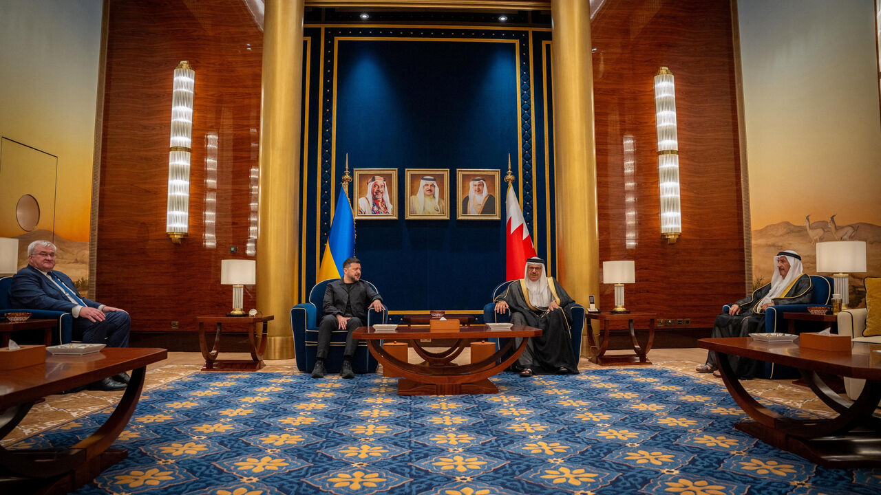 Bahrain's Foreign Minister Abdullatif bin Rashid Al Zayani meets Ukraine's President Volodymyr Zelenskiy at Bahrain International Airport, Muharraq, Bahrain, May 4, 2026. Bahrain News Agency/Handout via REUTERS