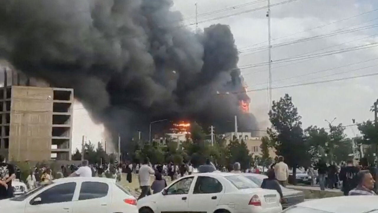 Flames and smoke rise after a fire broke out at a shopping center in Tehran, Iran, May 5, 2026, in this screen grab taken from social media video. SOCIAL MEDIA/via REUTERS