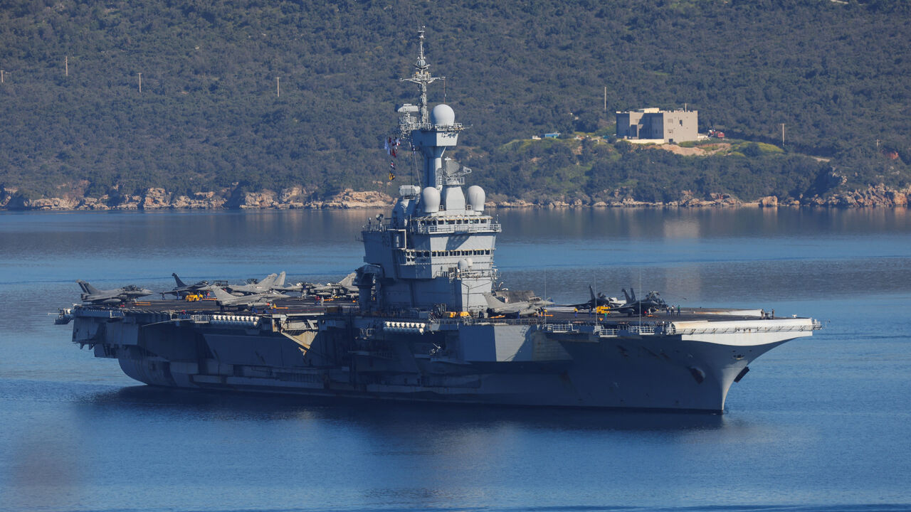 French aircraft carrier Charles De Gaulle departs from Souda Bay, on the island of Crete, Greece, April 7, 2026. REUTERS/Stefanos Rapanis