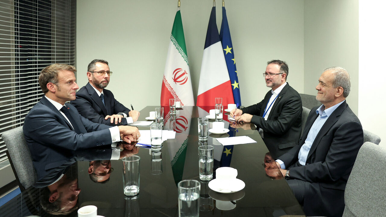 Iran's President Masoud Pezeshkian meets with France's President Emmanuel Macron in New York City, U.S., September 24, 2024. Iran's Presidency/WANA (West Asia News Agency)/Handout via REUTERS