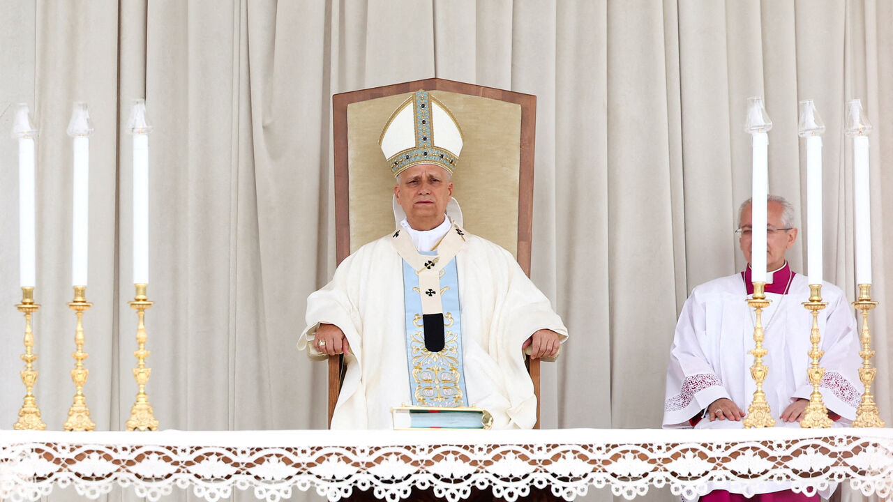 Pope Leo XIV leads a holy Mass in Piazza Bartolo Longo in front of the Shrine of the Virgin of the Rosary of Pompei, on the first anniversary of his election, in Pompei, Italy, May 8, 2026. REUTERS/Guglielmo Mangiapane