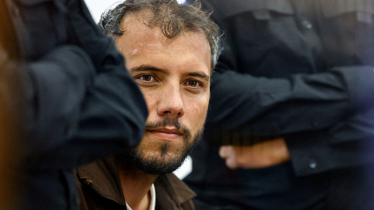 FILE PHOTO: Brazilian Activist Thiago Avila, who was detained aboard the Gaza-bound Global Sumud Flotilla, which was intercepted by Israeli forces in international waters, appears at a court in Beersheba, southern Israel May 6, 2026. REUTERS/Amir Cohen/File Photo