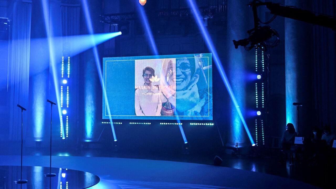 FILE PHOTO: The image of human rights lawyer Nasrin Sotoudeh (Iran) appears on screen as she receives the 2020 Right Livelihood Award during the digital award ceremony in Stockholm, Sweden December 3, 2020. Anders Wiklund/TT News Agency/via REUTERS /File Photo