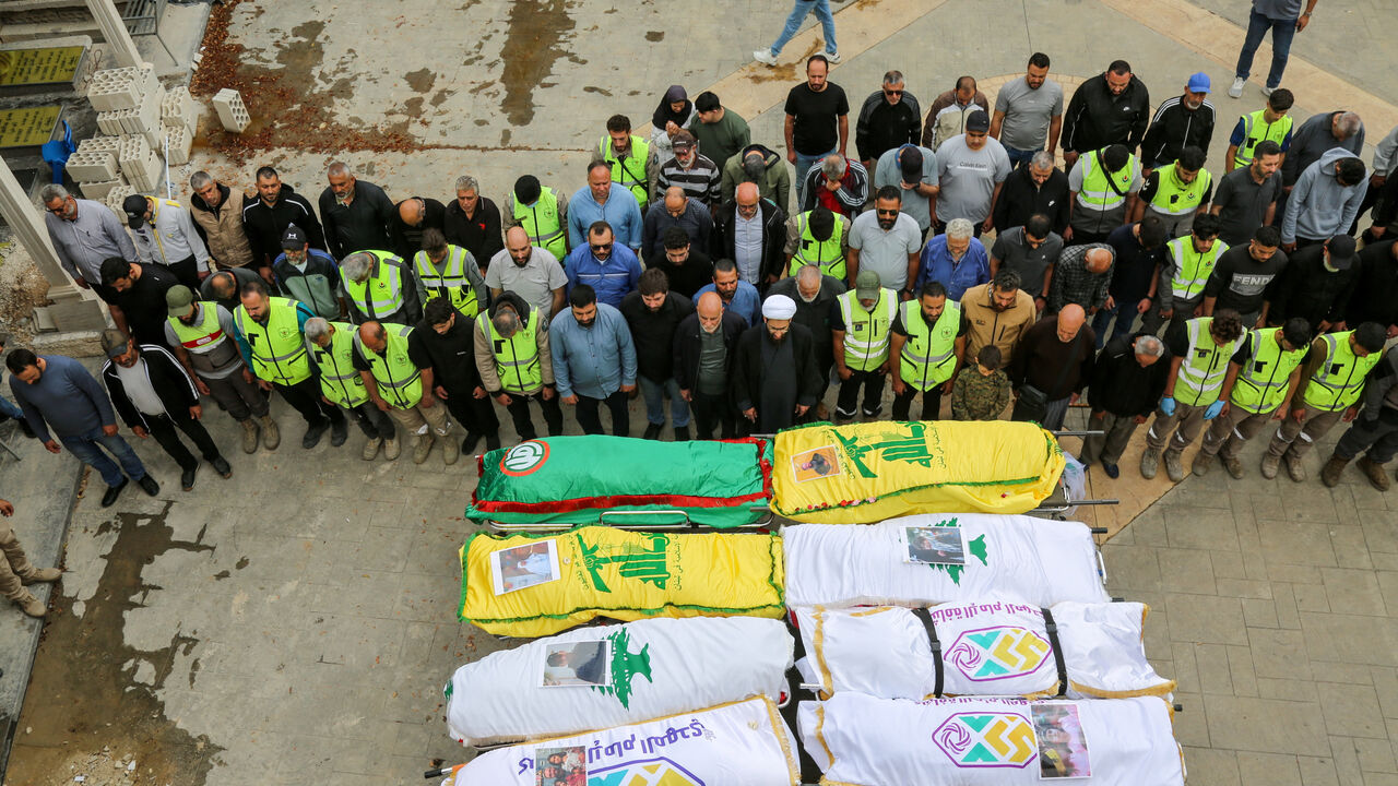 Mourners attend the funeral of people killed on Tuesday in an Israeli strike, in Deir Qanoun al-Nahr, southern Lebanon, May 21, 2026. REUTERS/Stringer