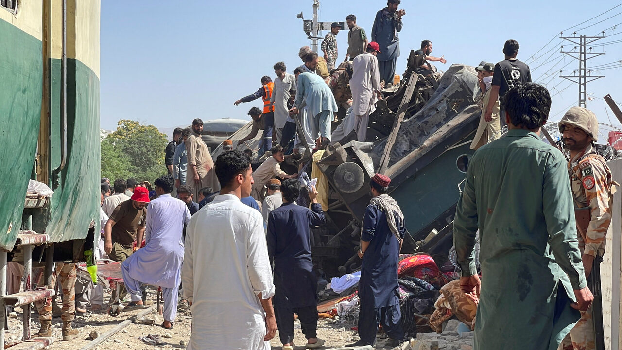People gather as they search for survivors after a blast near a railway track in Quetta, Pakistan, May 24, 2026. Picture taken with a mobile phone. REUTERS/Stringer