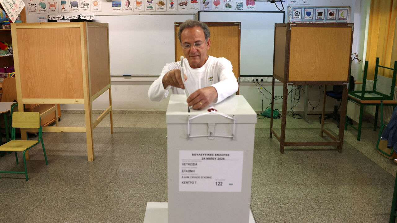 A man casts his vote during parliamentary elections at a polling station in Nicosia, Cyprus May 24, 2026. REUTERS/Yiannis Kourtoglou