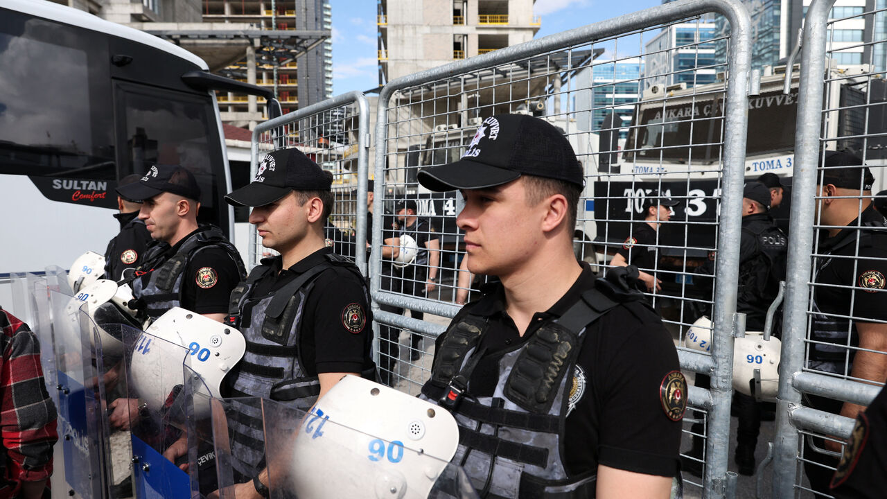 Riot police stand guard outside the headquarters of the main opposition Republican People's Party (CHP), after authorities ordered enforcement of a court ruling ousting the party's leadership from the building, in Ankara, Turkey, May 24, 2026. REUTERS/Efekan Akyuz