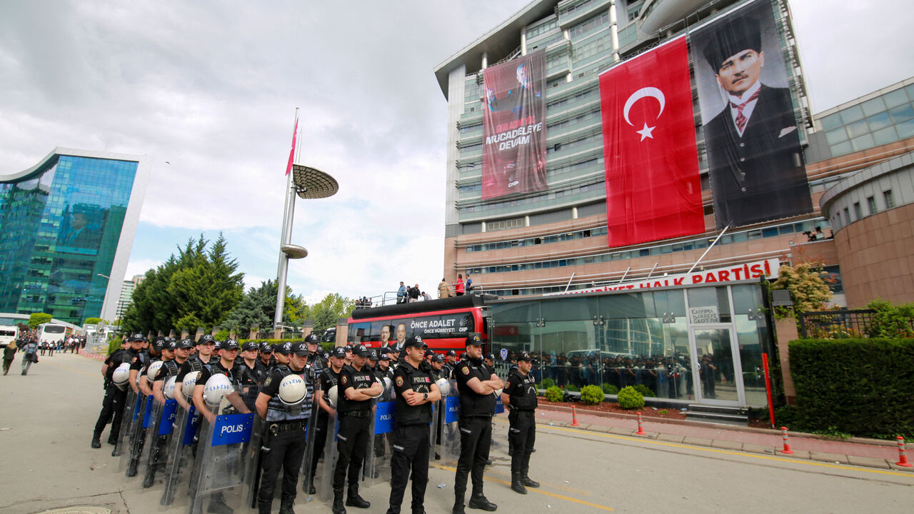 Riot police stand guard outside the headquarters of the main opposition Republican People's Party (CHP), after authorities ordered enforcement of a court ruling ousting the party's leadership from the building, in Ankara, Turkey, May 24, 2026. REUTERS/Efekan Akyuz