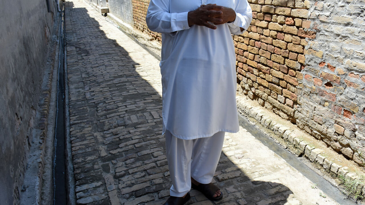 A Pakistani Shi'ite Muslim man, who was working as a driver in the United Arab Emirates, speaks with Reuters at his village, after being deported along with many others following the U.S.-Israeli war against Iran, in Chakwal, Pakistan May 5, 2026. REUTERS/Waseem Khan