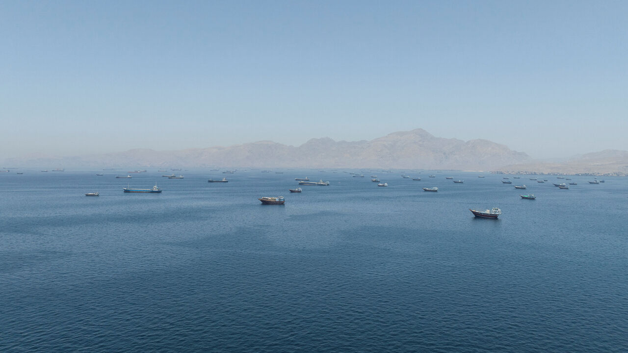 A drone view shows vessels sailing through the Strait of Hormuz, as seen from Musandam, Oman, May 25, 2026. REUTERS/Stringer
