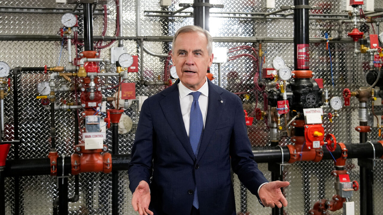 Canada's Prime Minister Mark Carney speaks at the United Association of Journeymen and Apprentices of the Plumbing and Pipefitting Industry of the United States and Canada (UA) office in Calgary, Alberta, Canada, May 15, 2026.  REUTERS/Todd Korol