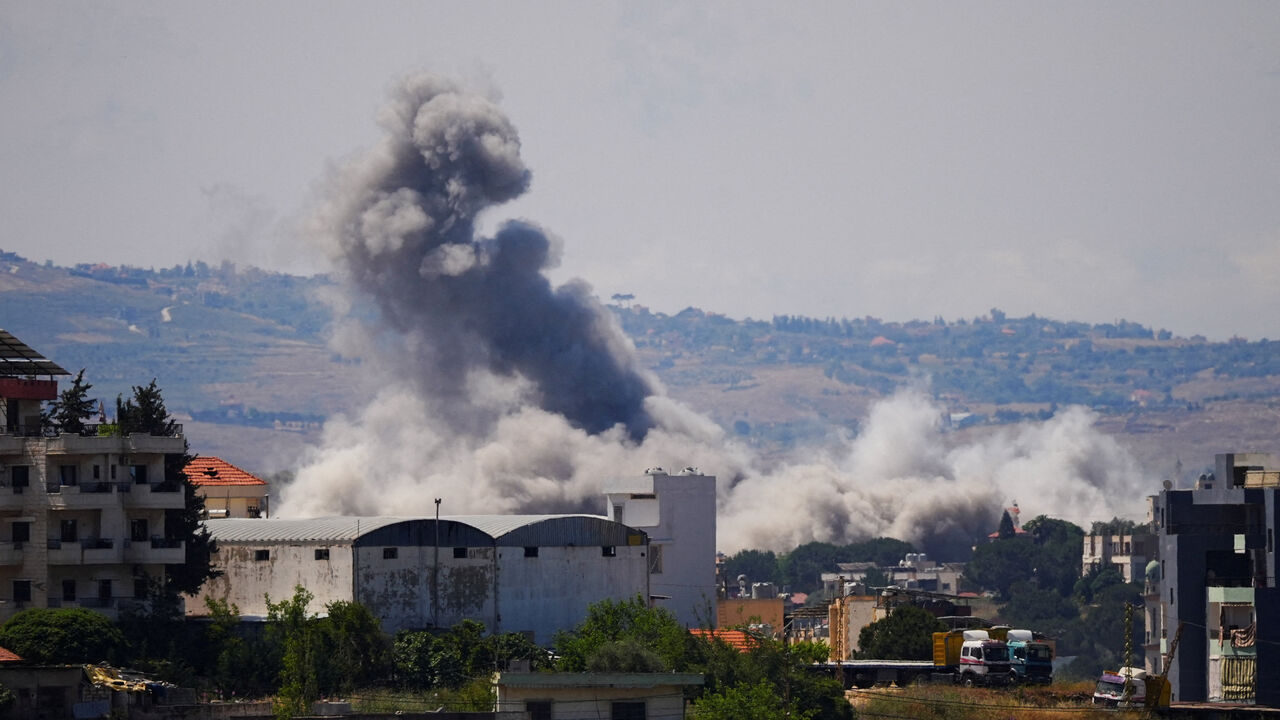 Smoke billows from southern Lebanon following Israeli strikes, as seen from Nabatieh, Lebanon May 28, 2026. REUTERS/Stringer