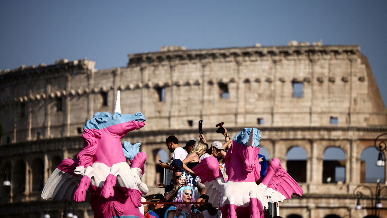 FILE PHOTO: People attend the annual LGBTQ+ Pride parade in Rome, Italy, June 14, 2025. REUTERS/Yara Nardi/File Photo