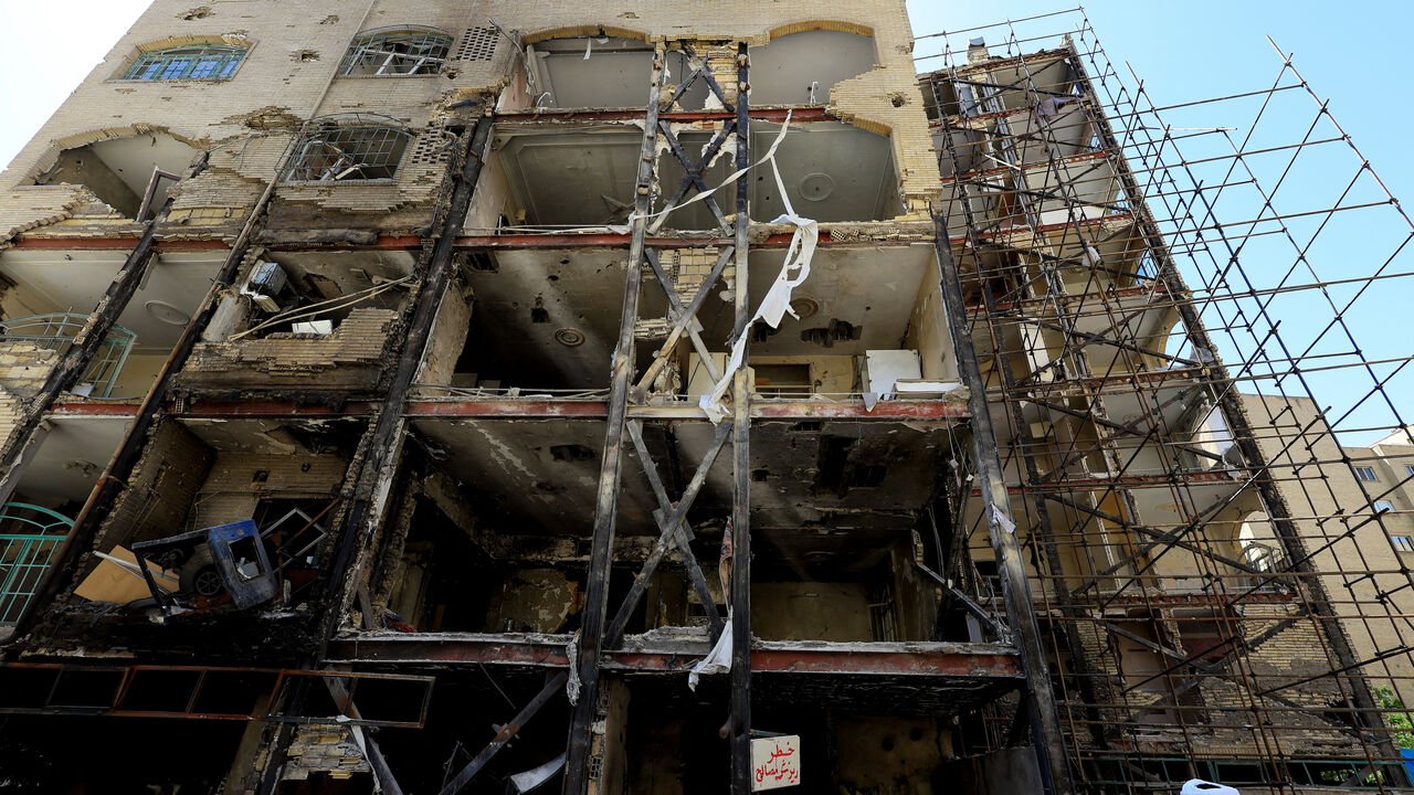 A residential building damaged by a strike on March 4, in Tehran, Iran, April 14, 2026. REUTERS/Thaier Al Sudani/File Photo
