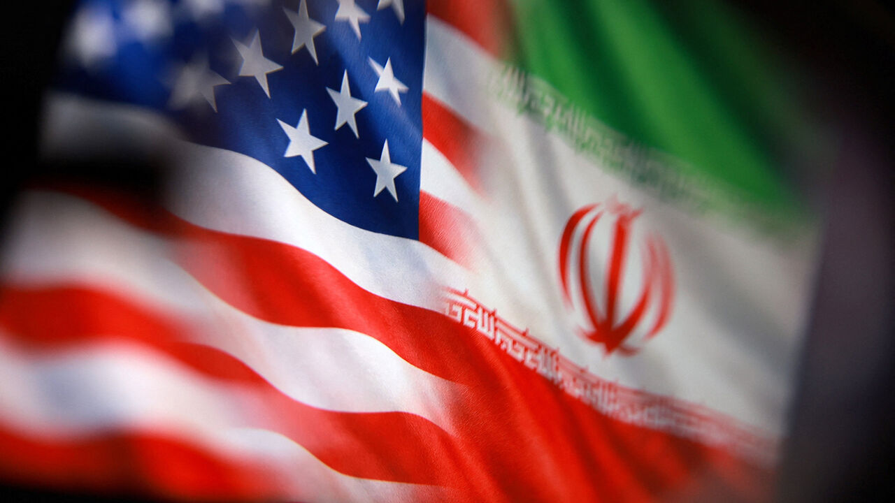 U.S. and Iranian flags are seen in this illustration taken March 23, 2026. REUTERS/Dado Ruvic/Illustration