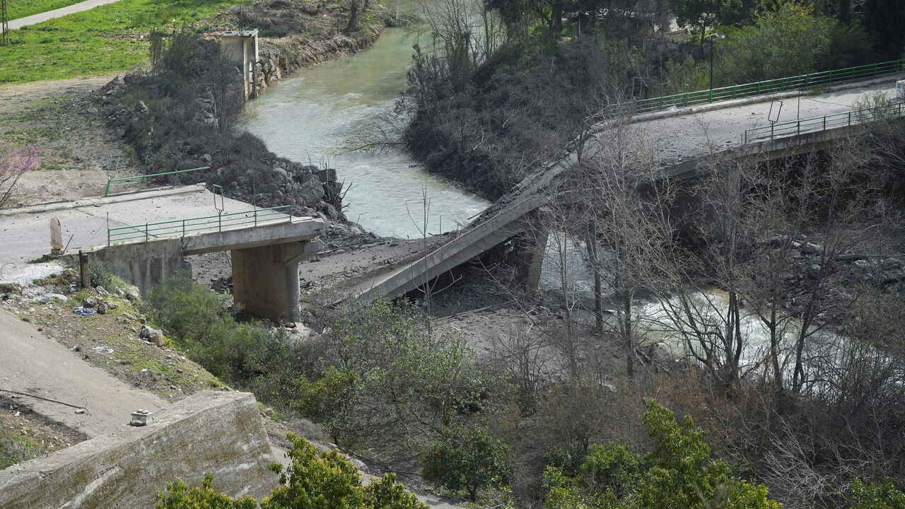 The damaged Zrarieh Bridge over the Litani river, after it was hit by an Israeli strike in Tayr Falsay in southern Lebanon, following an escalation between Hezbollah and Israel amid the U.S.-Israeli conflict with Iran, Lebanon, March 13, 2026. REUTERS/ Stringer