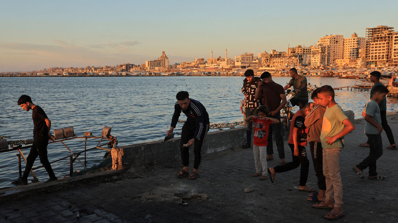 Palestinians gather at the site of an Israeli strike at a cafe at the seaport of Gaza City May 31, 2026. REUTERS/Dawoud Abu Alkas