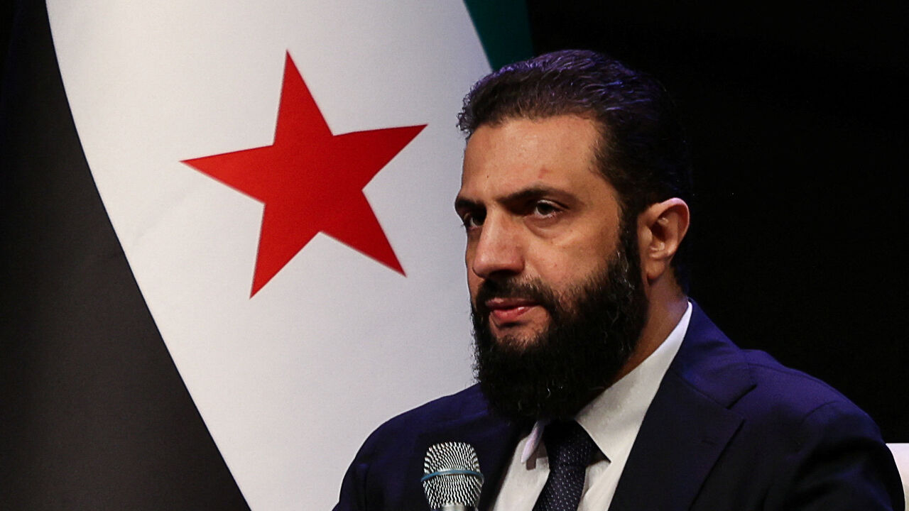 FILE PHOTO: Syrian President Ahmed al-Sharaa attends the Ministry of Awqaf conference titled "Unity of Islamic Discourse" at the Conference Palace in Damascus, Syria, February 16, 2026. REUTERS/Khalil Ashawi/ File Photo