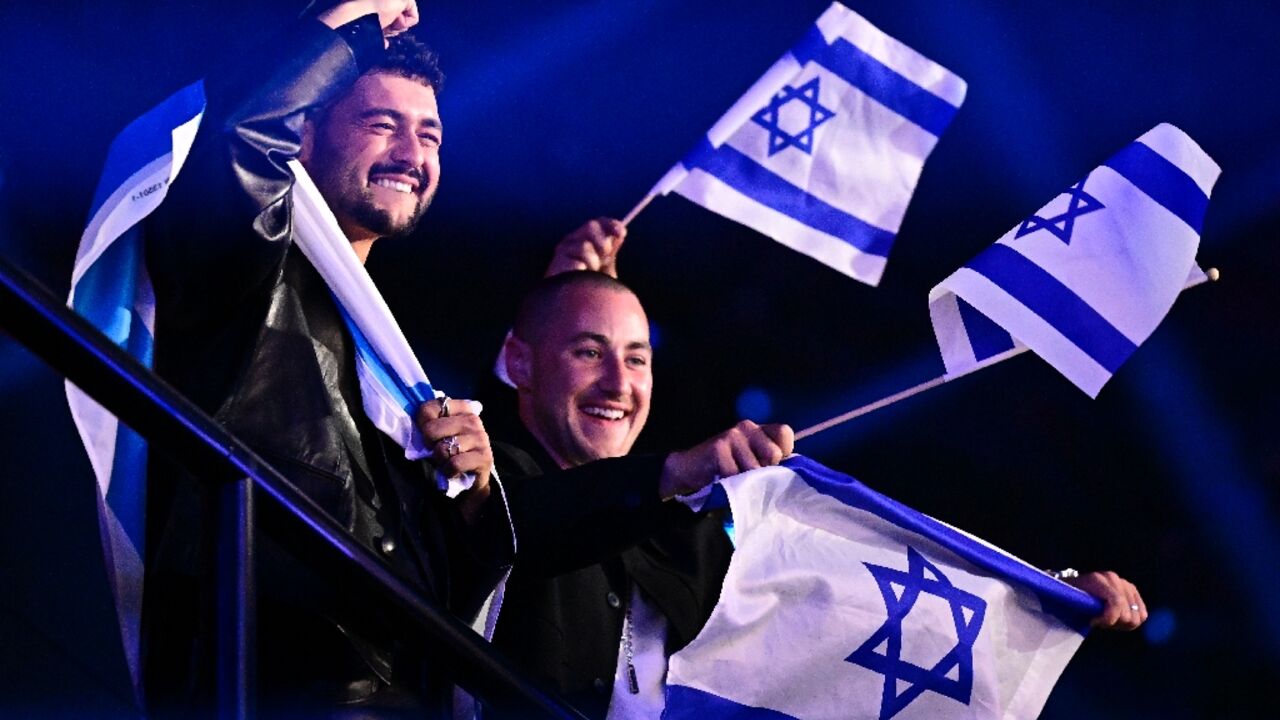 Israel's Noam Bettan (L) celebrated after being voted through to the Eurovision grand final in Vienna