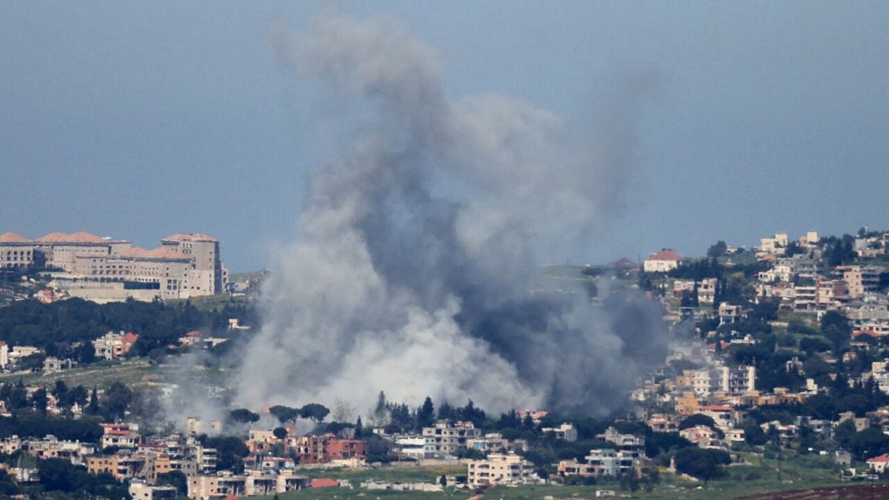 Smoke rises from the site of an Israeli strike that targeted the southern Lebanese village of Mayfadoun 