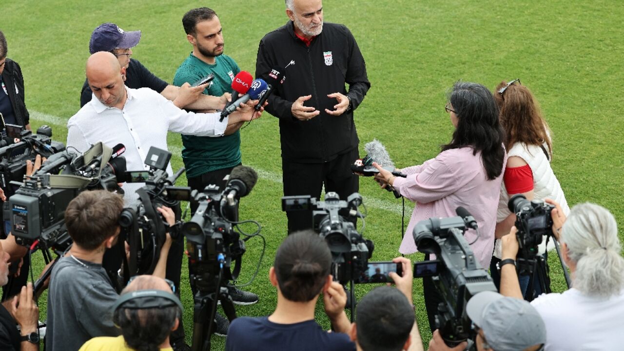 The vice-president of the Iranian Football Federation, Mahdi Mohammad Nabi, speaks to the media during a training session in Turkey