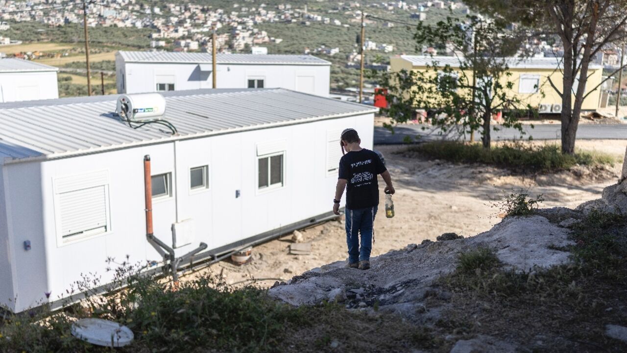 Israeli settlers return to the tiny settlement of Sa-Nur in northern West Bank after it was evacuated 20 years ago