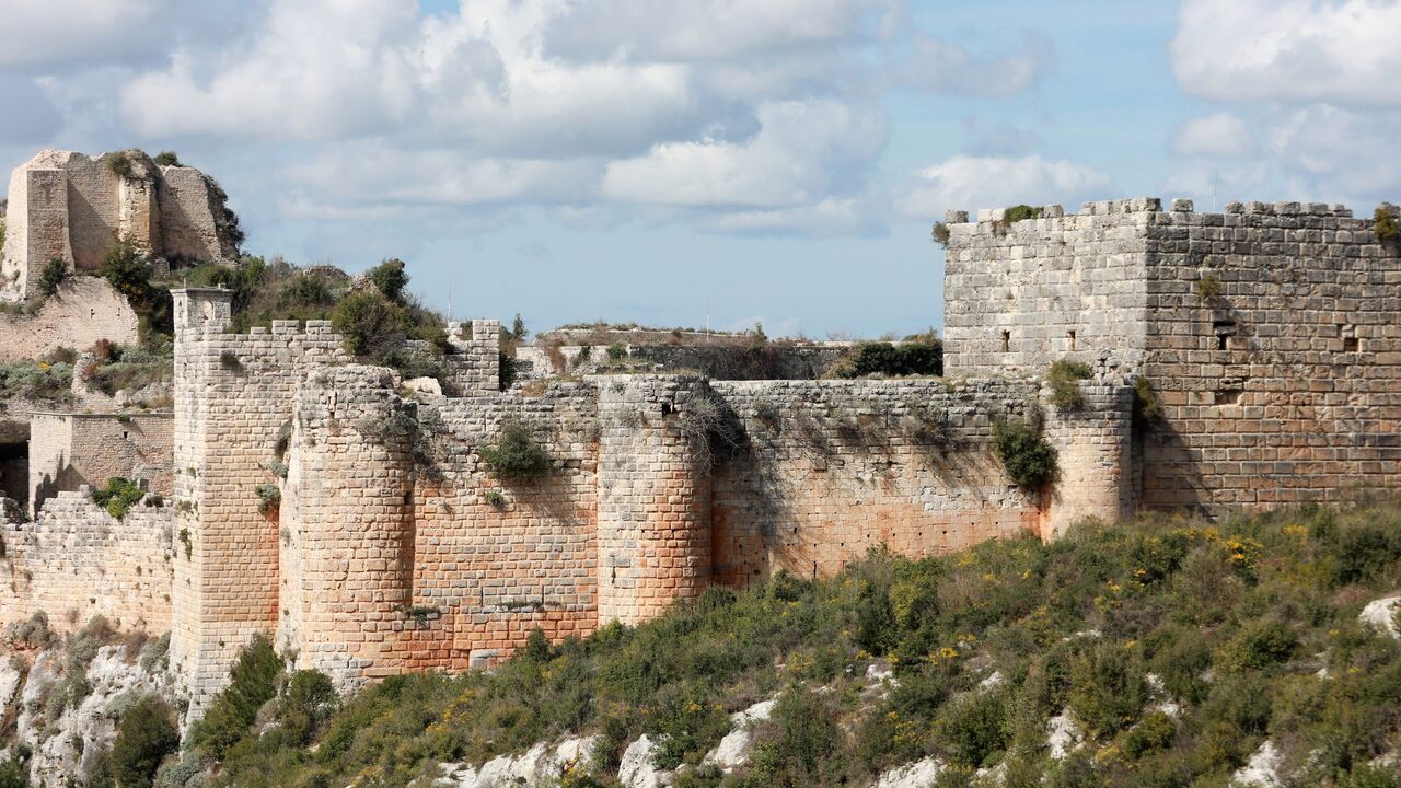 A picture shows a section of the external wall and towers of the Saladin Fortress, a UNESCO World Heritage site, in Syria's Latakia province on March 7, 2023. 