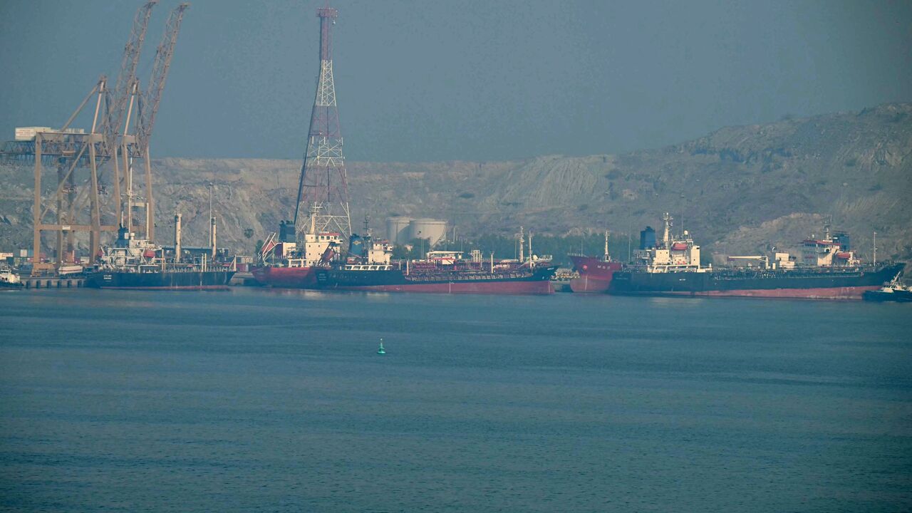 Tankers are seen at the Khor Fakkan Container Terminal in the Sharjah Emirate, along the Strait of Hormuz on June 23, 2025. (Photo by Giuseppe CACACE / AFP) (Photo by GIUSEPPE CACACE/AFP via Getty Images)