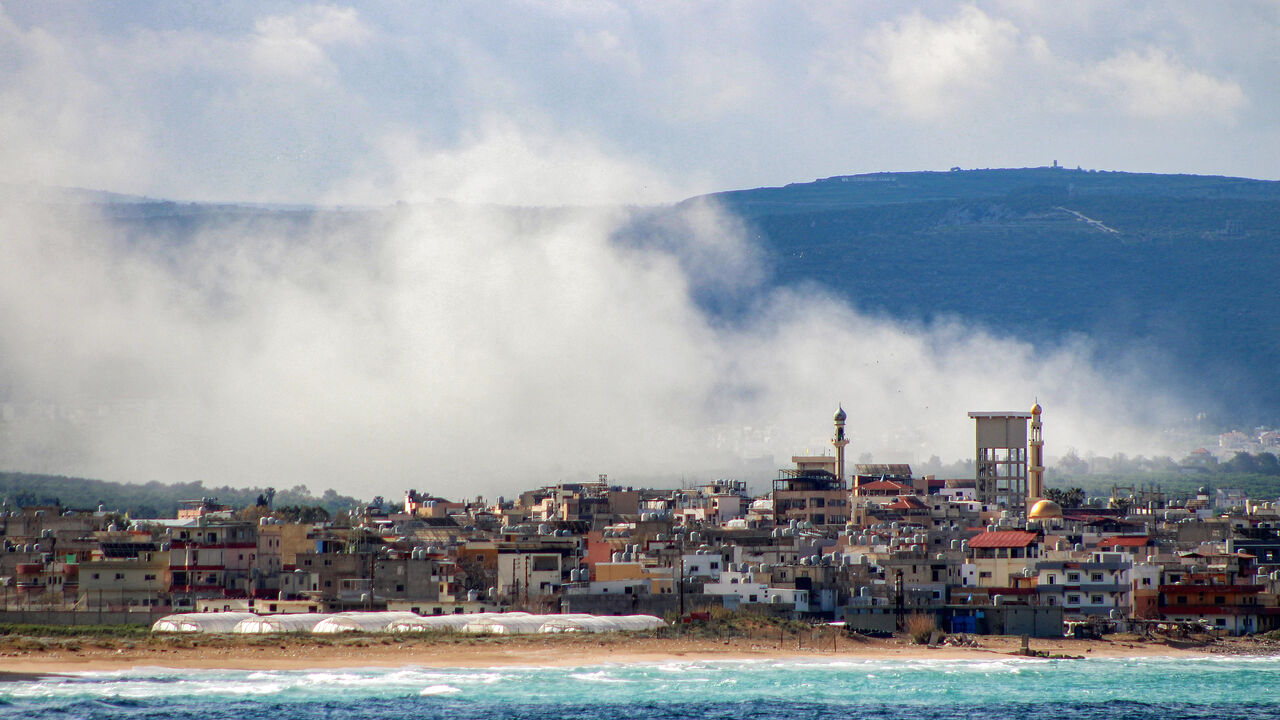 Smoke rises following Israeli bombardment on the village of Qlaile as pictured from nearby Tyre in southern Lebanon on April 7, 2026. The Israeli military said on April 7 that it had completed the deployment of ground troops along a "defence line" in southern Lebanon, where it is fighting Iran-backed Hezbollah. The military has not given any geographical details on the furthest point to which its soldiers have advanced into Lebanese territory. (Photo by Kawnat Haju/AFP via Getty Images)