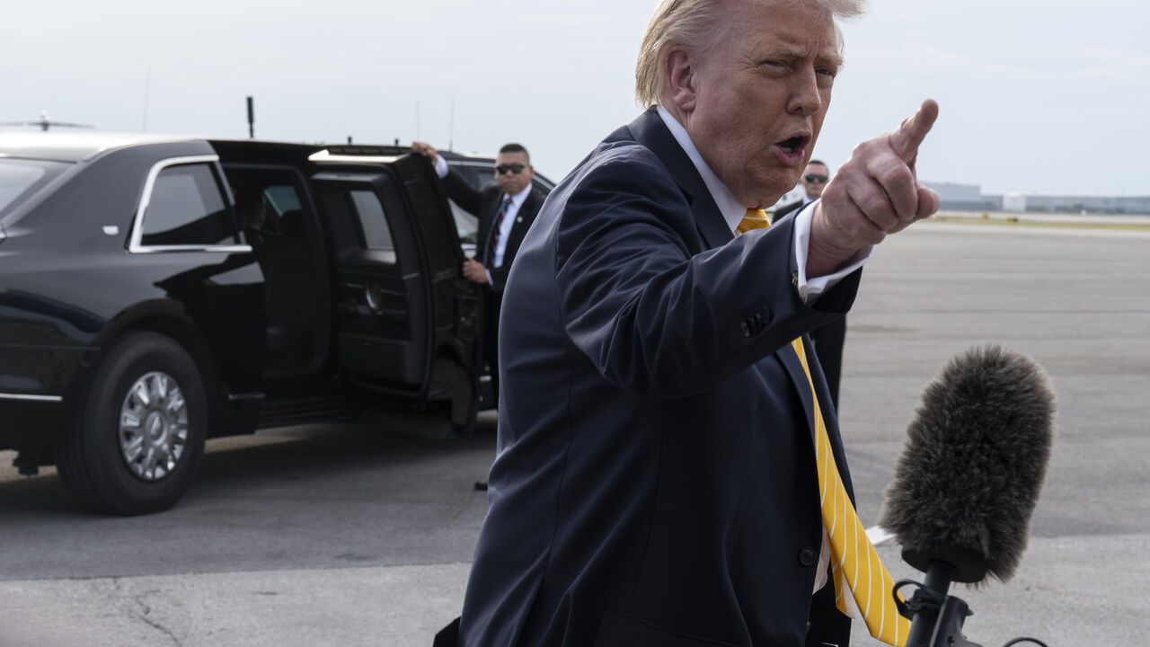 PALM BEACH, FLORIDA - MAY 2: U.S. President Donald Trump speaks to journalists before boarding Air Force One at Palm Beach International Airport on May 2, 2026 in Palm Beach, Florida. Trump is spending the weekend at his Mar-A-Lago resort. (Photo by Roberto Schmidt/Getty Images)