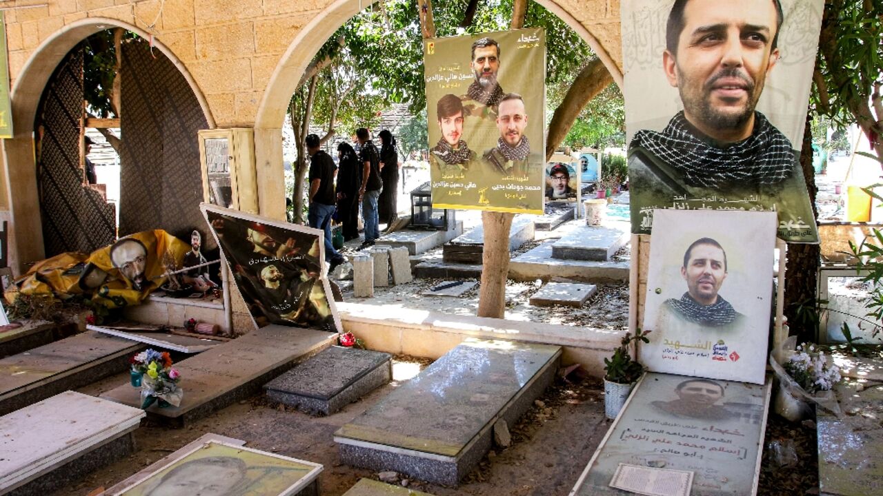 In the cemetery in south Lebanon's Deir Qanun al-Nahr, gravediggers prepare tombs for the village's "martyrs" in the latest Israel-Hezbollah war, near those killed in the previous conflicts between the foes