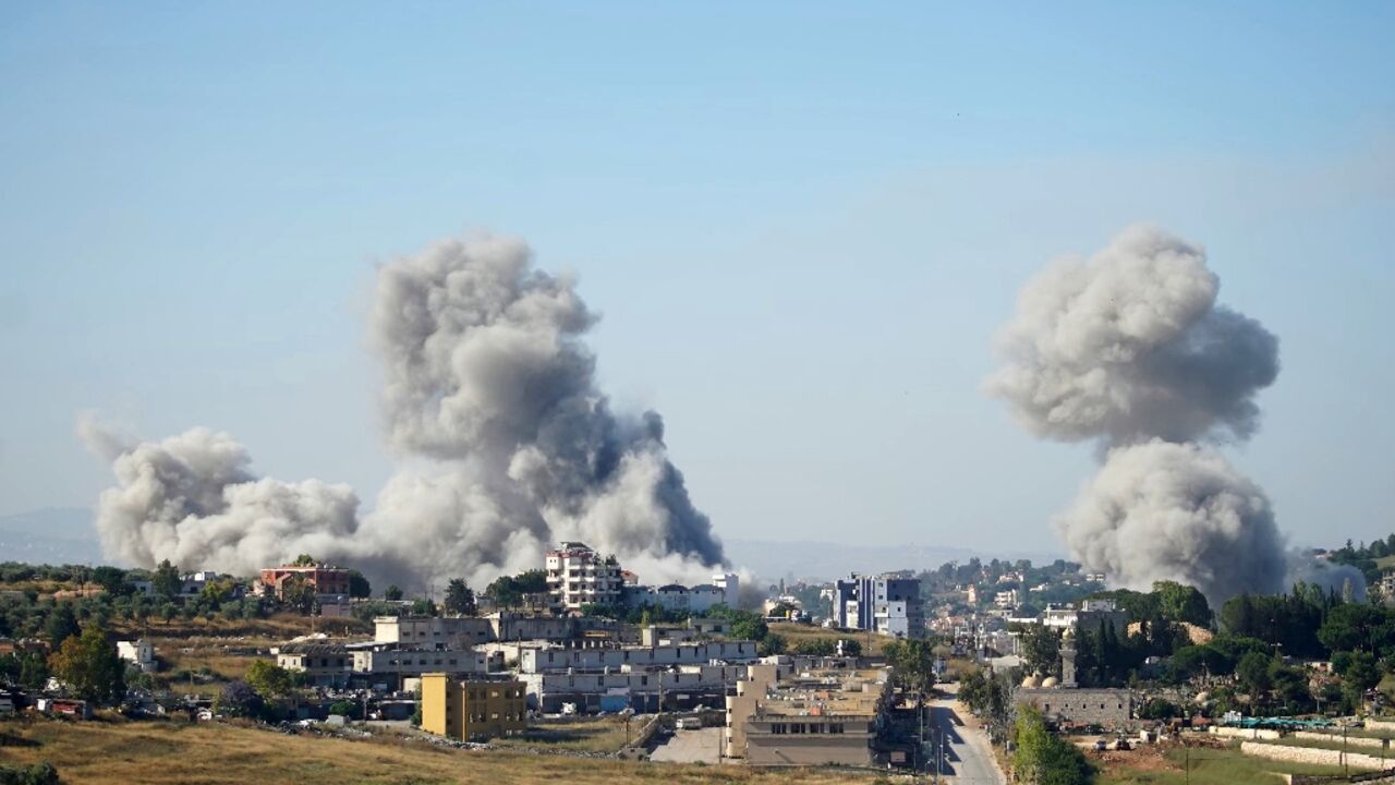 Smoke rises over the Lebanese city of Nabatieh after Israeli strikes carried out despite the announcement of a renewed ceasefire 