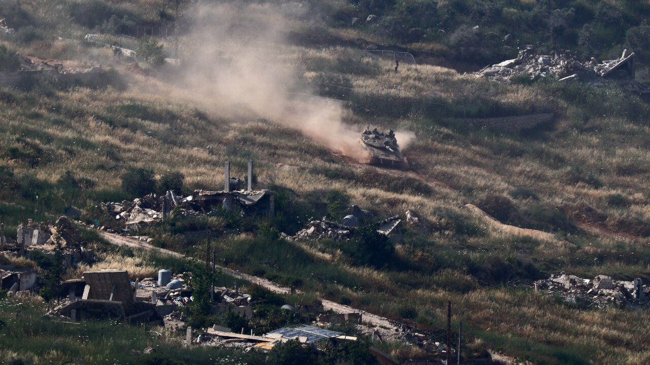 An Israeli tank maneuvers in southern Lebanon, as seen from northern Israel, May 31, 2026. REUTERS/Amir Cohen