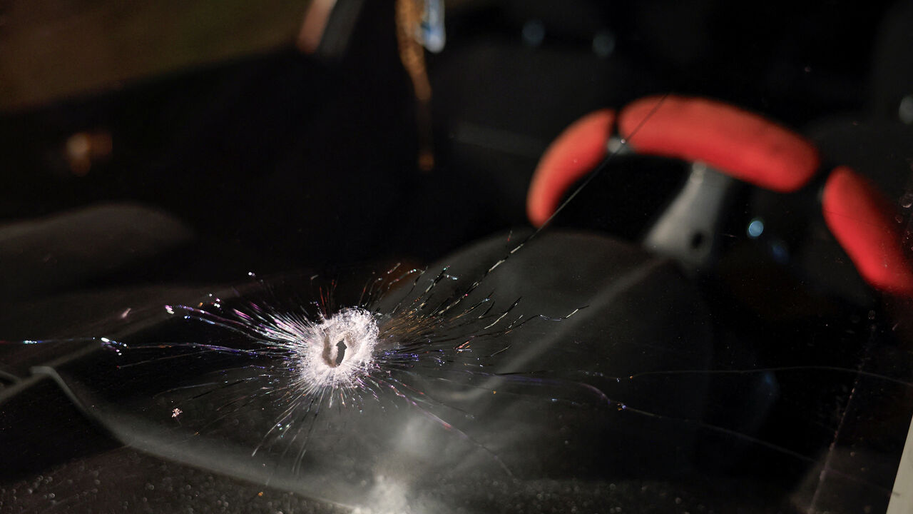 A bullet hole in the front window of a car of Palestinian father Fahed Abu Haykal after his seven-month-old baby was killed by Israeli forces, in Hebron in the Israeli-occupied West Bank, June 5, 2026. REUTERS/Mussa Qawasma