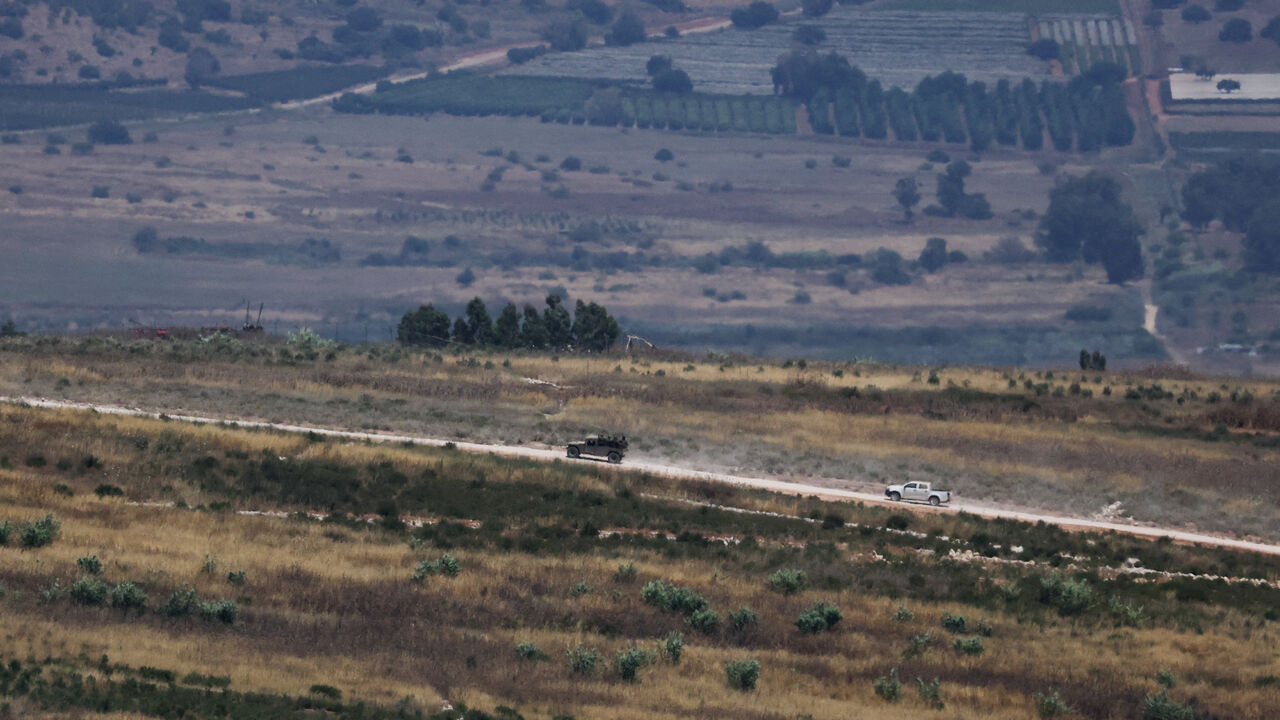 Israeli vehicles drive in southern Lebanon, as seen from the Israeli side of the Israel-Lebanon border, in northern Israel, June 10, 2026. REUTERS/Ammar Awad