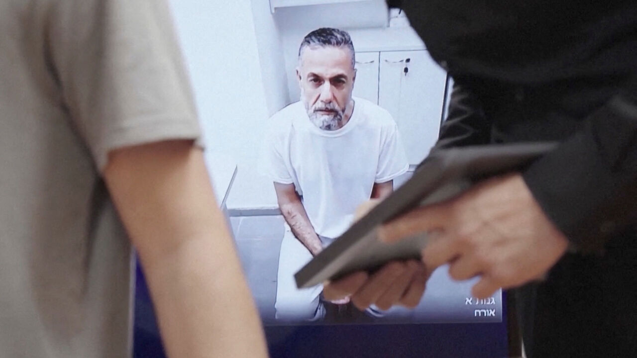 Palestinian doctor Hussam Abu Safiya, who was captured by the Israeli military in Gaza in late 2024 and still held in detention, appears via video link at the Israeli Supreme Court hearing in Jerusalem, June 10, 2026. REUTERS TV via REUTERS