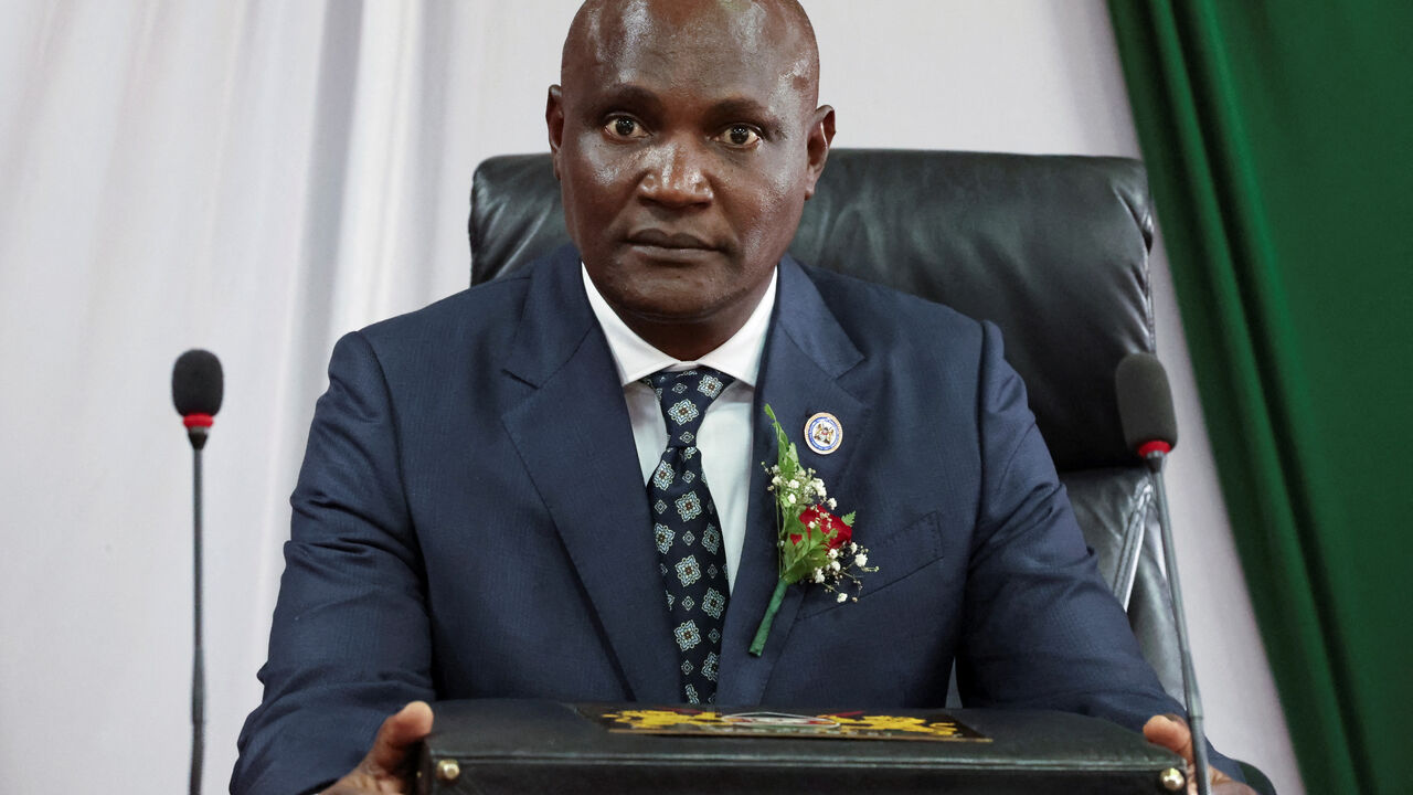 Kenya's Finance Minister John Mbadi reacts after arriving at the parliament building to present the Government Budget for the 2025/26 fiscal year in Nairobi, Kenya June 12, 2025. REUTERS/Monicah Mwangi