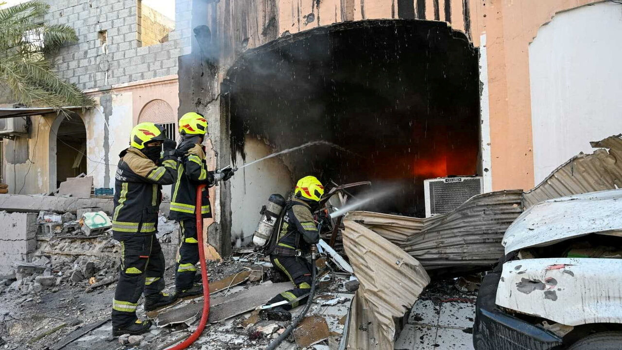 Firefighters work to extinguish fire in the aftermath of Iranian drone attacks, according to Bahrain's Interior Ministry, at a location given as Bahrain, in this handout image released on June 11, 2026. Ministry of Interior of the Kingdom of Bahrain/Handout via REUTERS