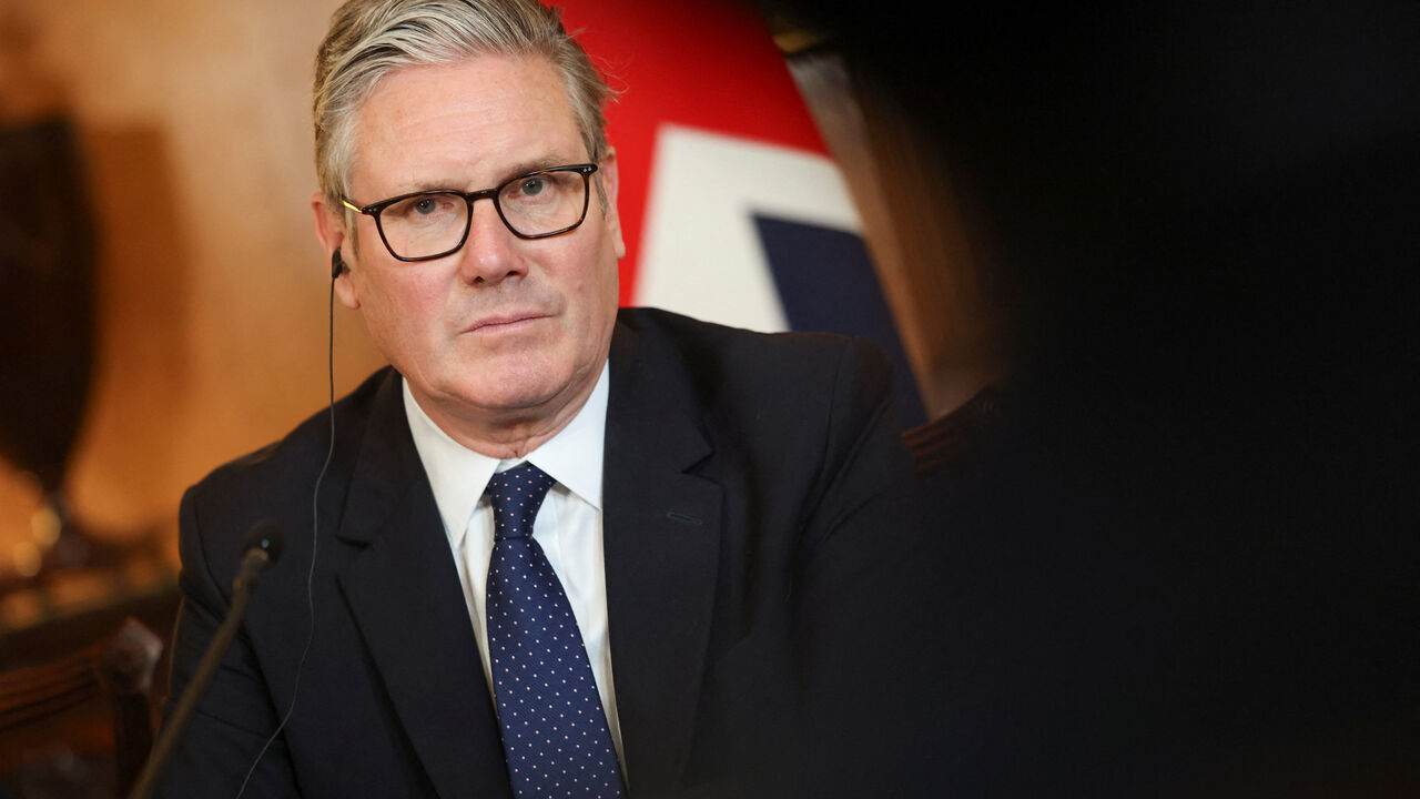 Britain's Prime Minister Keir Starmer and Japan's Prime Minister Sanae Takaichi (not pictured) attend a business roundtable meeting in Downing Street in London, Britain, June 14, 2026. REUTERS/Toby Shepheard/Pool