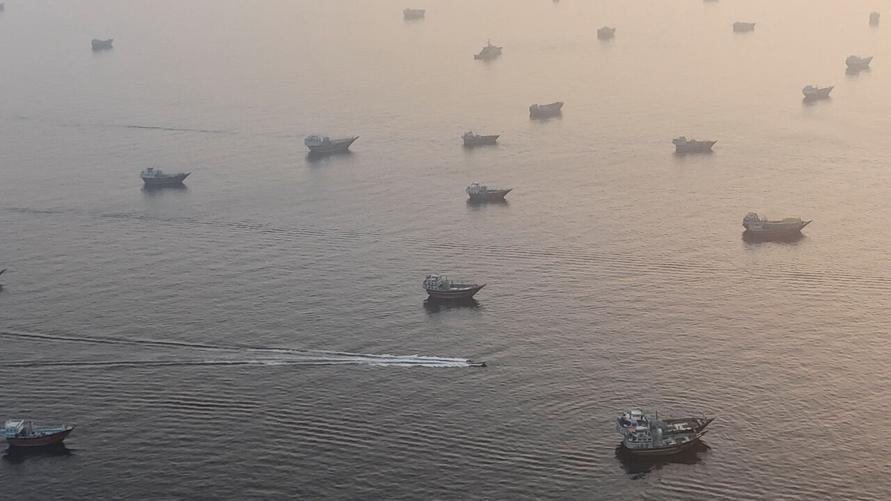 A drone view shows vessels in the Strait of Hormuz, as seen from Musandam, Oman, June 15, 2026. REUTERS/Stringer