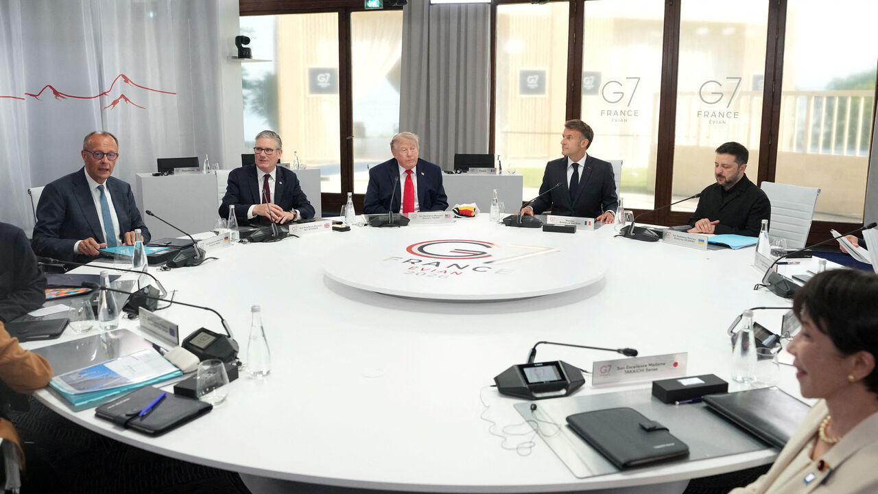 FILE PHOTO: German Chancellor Friedrich Merz, British Prime Minister Keir Starmer, U.S. President Donald Trump, French President Emmanuel Macron, Ukrainian President Volodymyr Zelenskyy and Japan’s Prime Minister Sanae Takaichi during a working session at the G7 summit in Evian-les-Bains, France, June 16, 2026. Thibault Camus/Pool via REUTERS/File Photo
