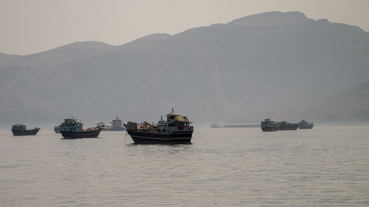 Vessels are anchored in the Strait of Hormuz, as seen from Musandam, Oman, June 19, 2026. REUTERS/Stringer