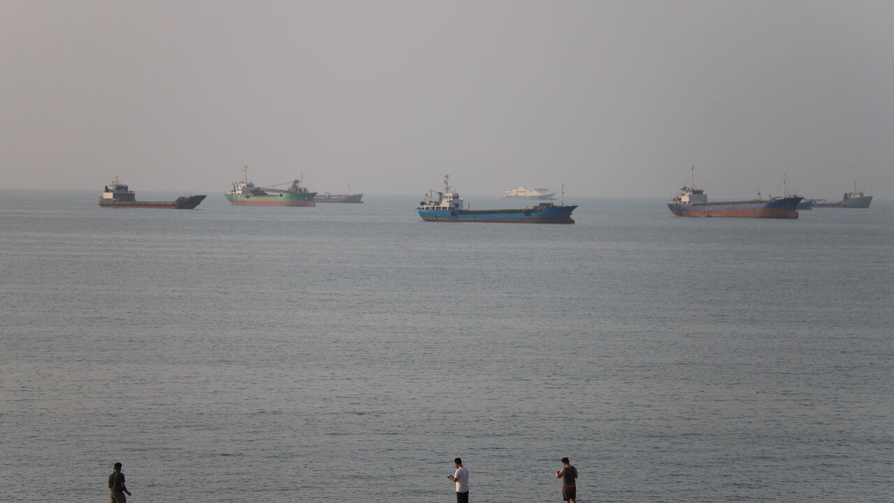 Vessels in the Strait of Hormuz near the beach of Bandar Abbas, Iran, June 21, 2026. Amirhosein Khorgooi/ISNA/via WANA (West Asia News Agency)via REUTERS