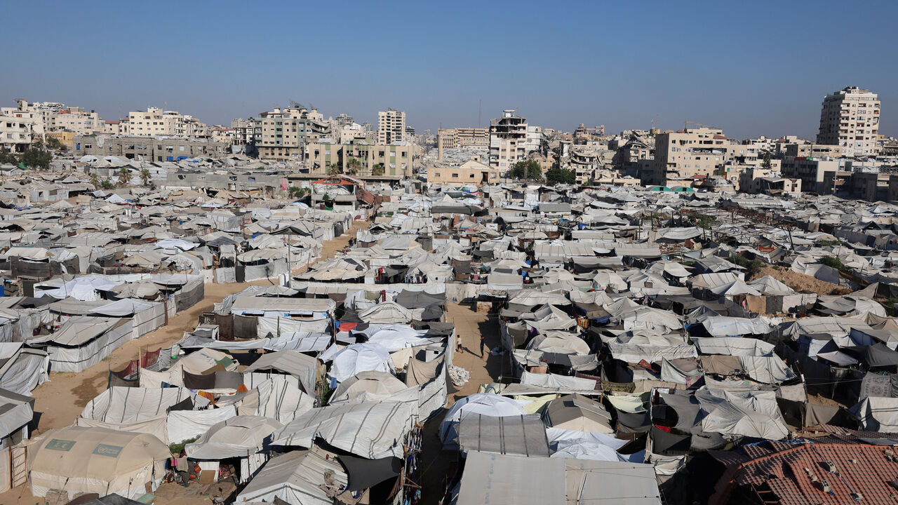Tents housing displaced Palestinians stand amid summer heat in Gaza City, June 20, 2026. REUTERS/Dawoud Abu Alkas