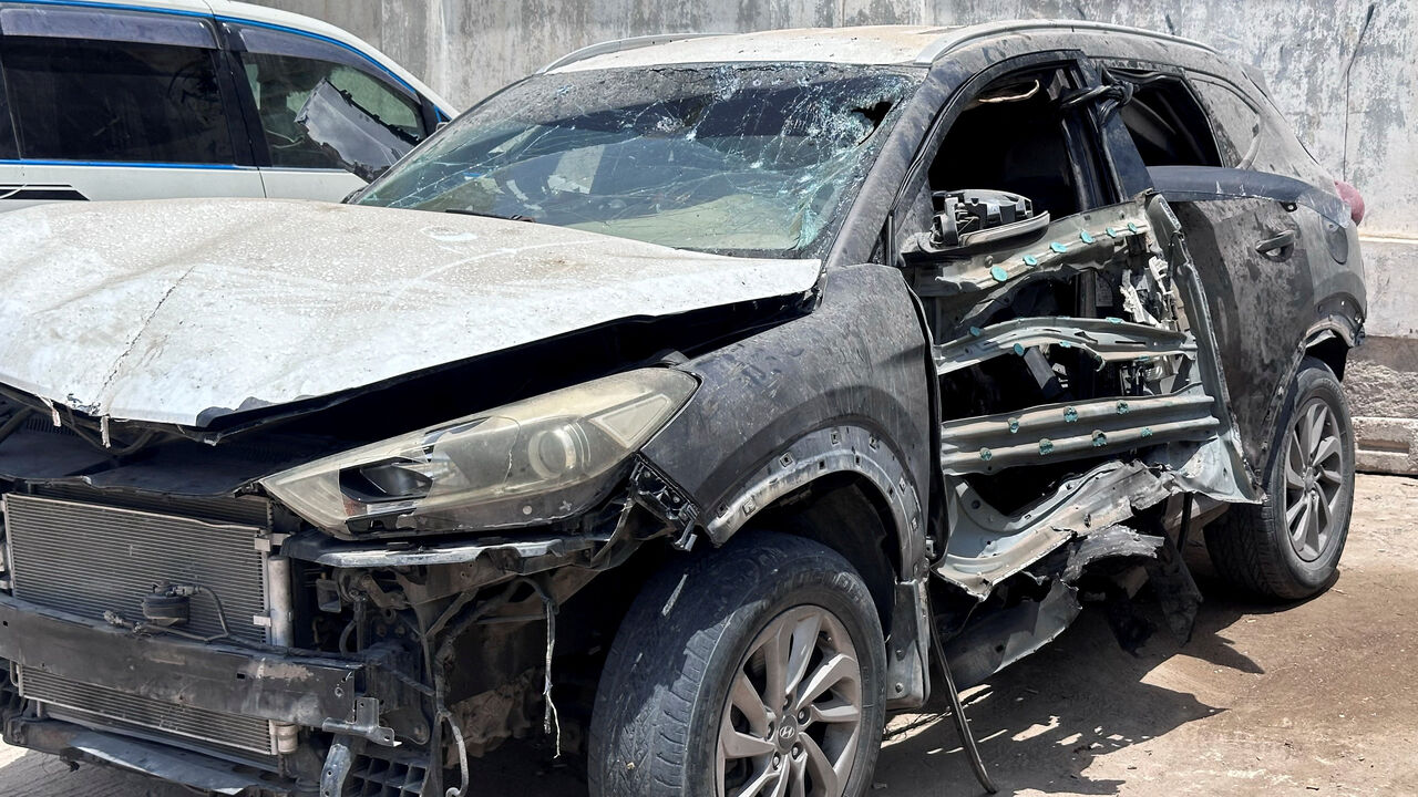 Car of Mohammed Aydah, a Yemeni journalist at the Saudi-owned television network al-Arabiya, is pictured at the yard of a police station after an explosive device planted in the car detonated and killed him, in Mukalla, Yemen June 25, 2026. Picture taken with a mobile phone. REUTERS/Stringer