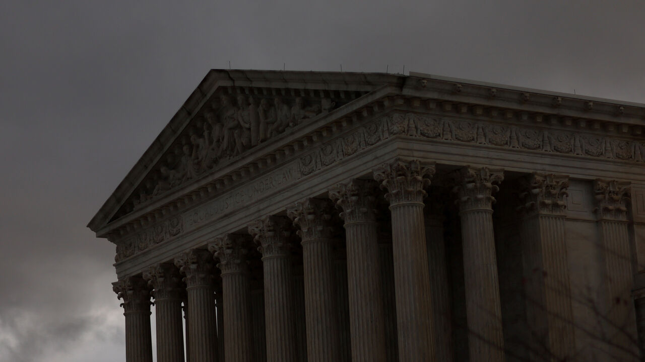The sun sets on the U.S. Supreme Court building after a stormy day in Washington, U.S., November 11, 2022. REUTERS/Leah Millis