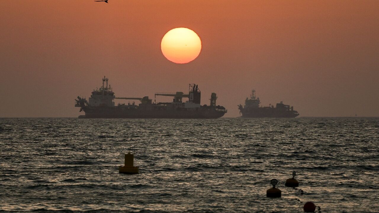The United States said it shot down a pair of Iranian drones threatening the Strait of Hormuz