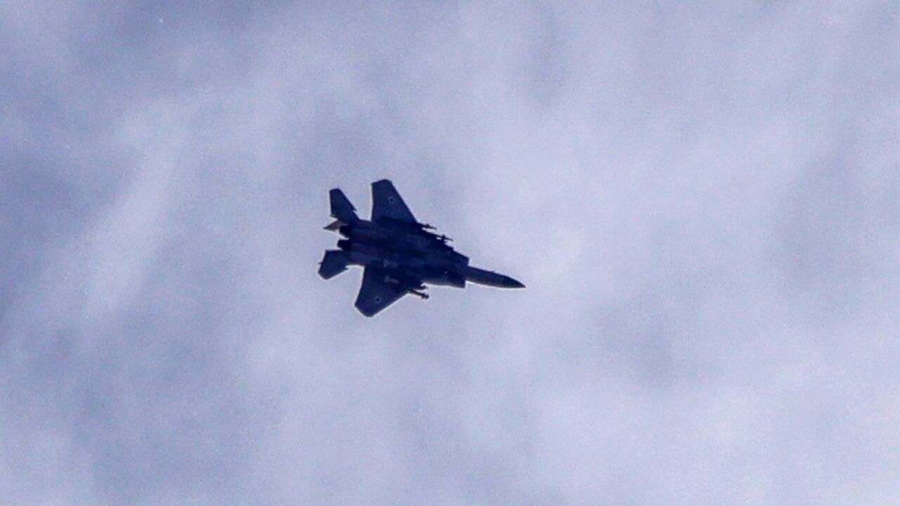 An Israeli fighter jet flies over the southern Lebanese area of Marjayoun on June 3