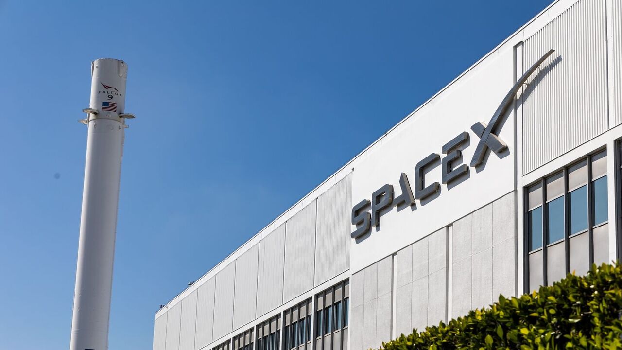 The headquarters of SpaceX in Hawthorne, California, with a Falcon 9 booster in March 2024. — Getty Images