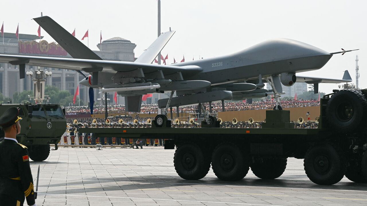 An unmanned aerial vehicle is seen during a military parade marking the 80th anniversary of victory over Japan and the end of World War II, in Beijing's Tiananmen Square on September 3, 2025. (Photo by GREG BAKER / AFP) (Photo by GREG BAKER/AFP via Getty Images)